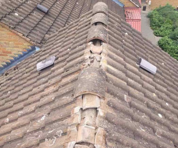 This is a photo if a roof ridge which has missing tiles. The ridge tiles are being replaced by LKP Roofing Thorne